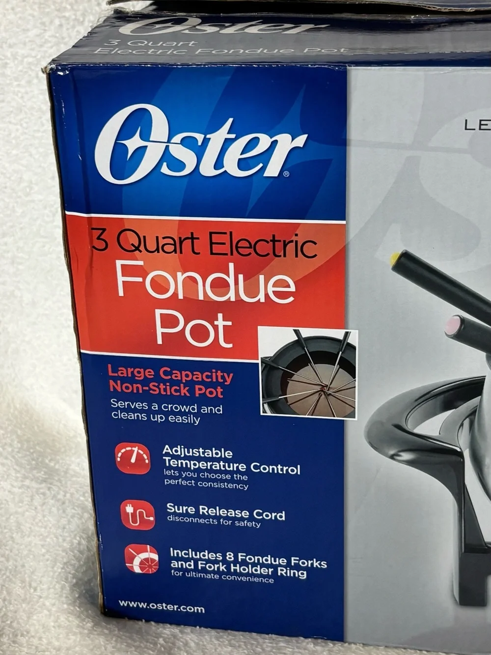 Oster Silver Stainless Steel Chocolate Fondue Pot with Black Fork Handles
